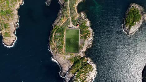 The-incredible-football-field-of-Henningsvaer-in-Lofoten,-Norway-seen-from-above