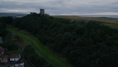 Establishing-Drone-Shot-of-Scarborough-Castle-in-Low-Light