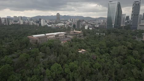 Aerial-orbits-Chapultepec-Castle-in-large-urban-park-in-Mexico-city
