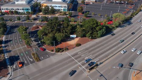 Meta-headquarters,-massive-campus-area,-aerial,-tilt-down-on-sign