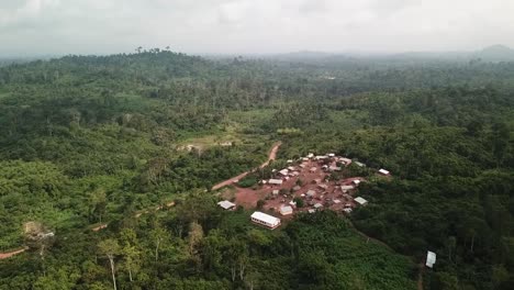 Far-away-drone-view-of-a-remote-African-village-in-Ghana