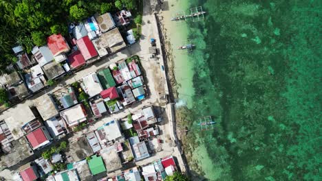 Top-down-view,-poor-third-world-coastal-fishing-village-Baras-in-the-Philippines