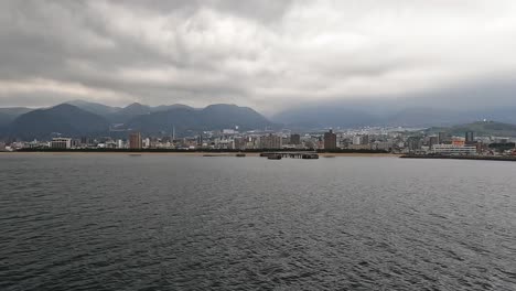 Skyline-of-Beppu-view-from-the-water.-Japan