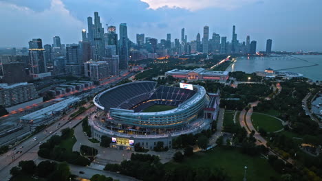 Aerial-view-around-the-Soldier-field-Stadium,-gloomy,-summer-evening-Chicago,-USA