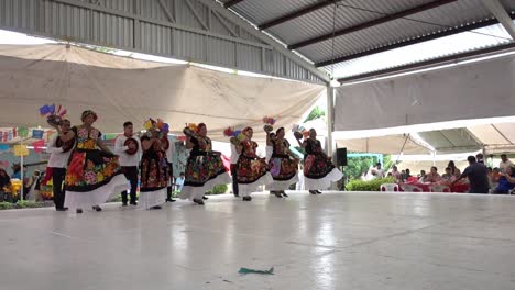 Slow-motion-shot-of-men-and-women-dancing-in-time-at-the-Guelaguetza