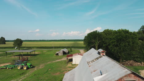 Flying-Over-Vintage-Barn-Houses-Near-Agricultural-Plantation-Near-Biscoe-In-Prairie-County,-Arkansas,-United-States