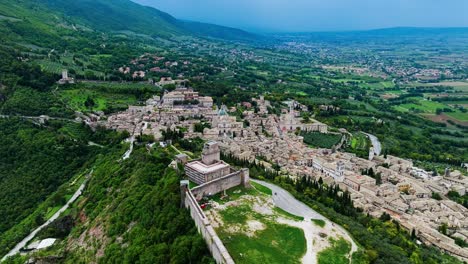 Aerial-View-Of-Rocca-Maggiore-Castle,-Valley-of-Tescio-In-Assisi,-Umbria-Italy