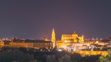 close-up-night-timelapse-of-Cordoba-Mezquita-Mosque-cathedral-and-roman-bridge-during-the-night-city-lights