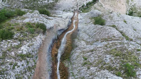 Kefalovriso-Waterfall,-Cascade-in-Greece-at-Tzoumerka-National-Park---Aerial-Birdseye