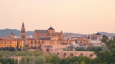 Close-up-Sunrise-night-to-day-timelapse-of-Cordoba-Mezquita-Mosque-cathedral-and-roman-bridge-during-summer