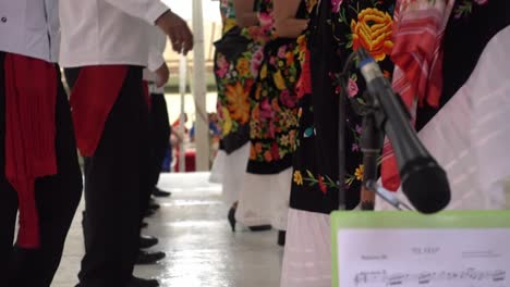 Slow-motion-bokeh-shot-of-male-and-female-dancers-in-traditional-fashion-at-Guelaguetza