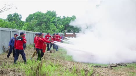 The-fire-service-provided-material-to-volunteers-by-simulating-extinguishing-fires-in-barrels-oil-tanks-using-fire-extinguishers-APAR