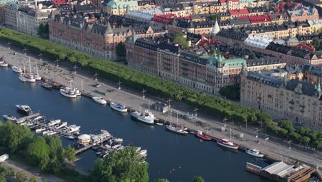 Aerial-view-of-notable-street-and-waterfront-promenade-in-Stockholm,-Sweden