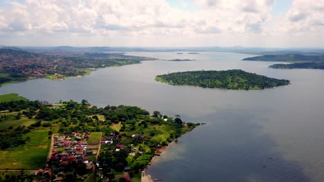 Panoramic-Aerial-View-Of-Coastal-Residential-Property-Developments-On-The-Islands-Of-Lake-Victoria,-Uganda,-Africa