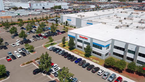 Aerial-view-circling-ThermoFisher-scientific-facilities-in-Silicon-Valley,-California