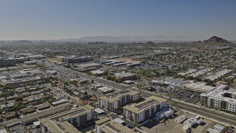 Scottsdale-Arizona-Aerial-v21-establishing-shot-drone-flyover-and-around-north-road-capturing-Tempe-Phoenix-cityscape,-rock-formation-and-desert-landscape-view---Shot-with-Mavic-3-Cine---February-2022