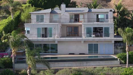 The-former-real-life-Barbie's-Malibu-Beach-House---pullback-aerial-reveal