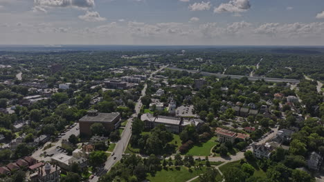 Macon-Georgia-Aerial-v21-panoramic-views-drone-flyover-Mercer-University-campus-ground-featuring-building-of-school-of-law-and-downtown-cityscape---Shot-with-Mavic-3-Cine---September-2022