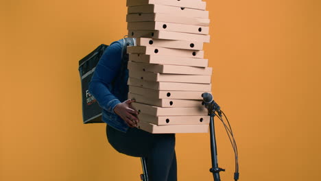 Woman-Holds-Stack-Of-Boxes-For-Delivery