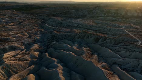 Picturesque-view-of-sunset-over-dry-badlands