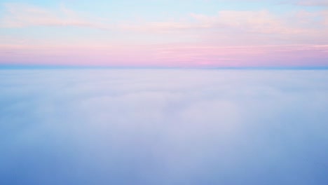 Amazing-view-over-clouds-at-sunset