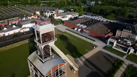 Antiguas-Instalaciones-De-Construcción-De-Pozos-Mineros-En-Genk,-Bélgica,-Vista-Aérea-De-Drones