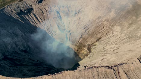 aerial-view-looking-down-inside-the-crater-and-caldera-of-Mount-Bromo-an-active-somma-volcano,-Bromo,-East-Java,-Indonesia