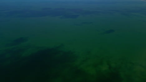 Calm-transparent-Baltic-sea-water-from-above,-aerial-drone-view
