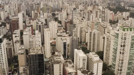 Aerial-birds-eye-shot-showing-crowded-towers-and-buildings-in-downtown-of-Sao-Paulo,-Brazil