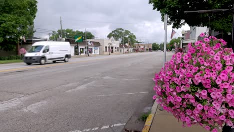 Downtown-Bristol,-Indiana-with-traffic-and-gimbal-video-stable