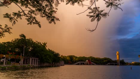 Timelapse-at-Villahermosa-Tabasco-Mexico-Tomas-Garrido-Canabal-Park-La-Venta-Museum-Ilusiones-Lagoon-during-sunset-storm-clouds