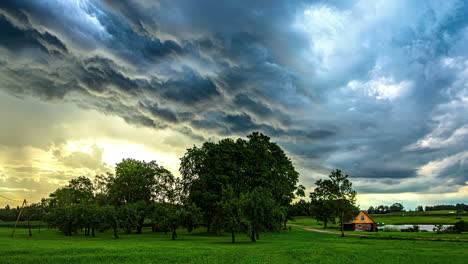 A-Time-Lapse-Shot-Of-A-Cloudy-Weather-And-A-Green-Grassy-Landscape-With-Trees