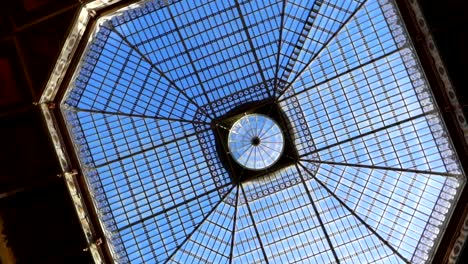 Orbit-shot-around-glass-roof-of-Palacio-da-Bolsa-in-Porto,-Portugal