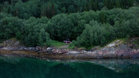 Camping-by-the-calm-lake-in-Sørfold,-Leirfjord-in-Norway
