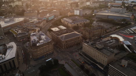 Establishing-Drone-Shot-Over-Bradford-City-Centre-at-Golden-Hour-Sunset