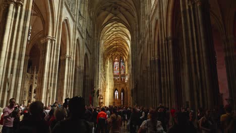 tourists-inside-Metropolitan-Cathedral-of-Saints-Vitus,-Wenceslaus-and-Adalbert,-a-Roman-Catholic-metropolitan-cathedral-in-Prague,-Czech-Republic