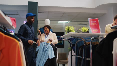 Customer-checking-fashion-items-on-racks