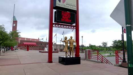 City-of-Elkhart,-Indiana-sign-downtown-with-gimbal-video-tilting-up