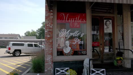 Historic-Myrtles-Pie-shop-in-downtown-Princeton,-Illinois-with-gimbal-video-panning-left-to-right