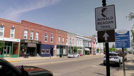 Ronald-Reagan-trail-sign-in-downtown-Princeton,-Illinois-with-gimbal-video-stable