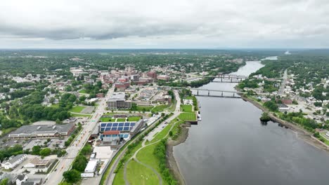 Drone-shot-of-the-Penobscot-River-flowing-along-Bangor,-Maine