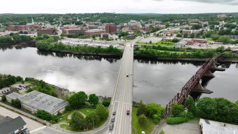 Drone-shot-pulling-away-from-the-Penobscot-River-in-Bangor,-Maine