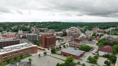 Drone-shot-flying-over-Bangor,-Maine-on-an-overcast-day