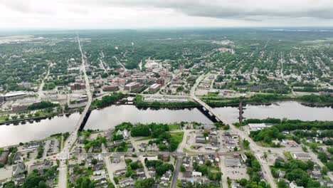 Wide-aerial-view-of-Bangor,-Maine-on-a-cloudy-day