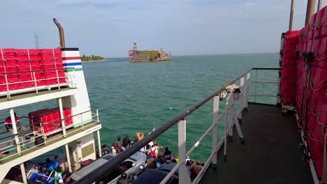 Kunta-Kinteh-Ferry-Sailing-from-Banjul-to-Barra-with-Karadeniz-Powership-in-Background
