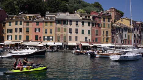Scene-of-a-family-riding-Jet-ski-on-the-azure-waters-of-the-Ligurian-Sea-in-Portofino,-Italy