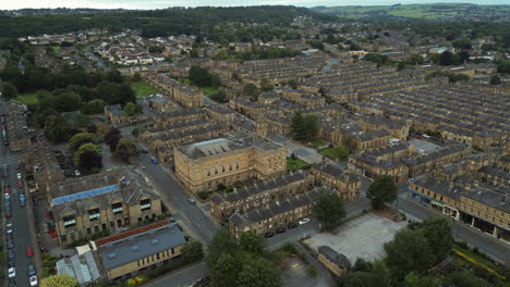 Establishing-Drone-Shot-Over-Saltaire-Terraced-Houses-and-Victoria-Hall