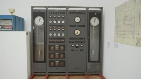 Double-clock-on-exhibition-Inside-National-Technical-Museum-in-Prague,-Czech-Republic,-static-shot