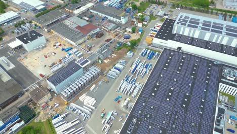 Aerial-view-of-modern-storage-warehouse-with-solar-panels-on-the-roof