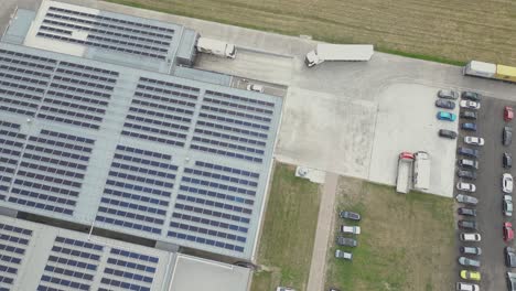 Aerial-view-of-modern-storage-warehouse-with-solar-panels-on-the-roof